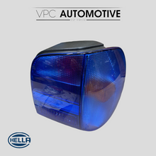 Load image into Gallery viewer, Polo 6n Hella Colour Magic Series - Blue Taillights
